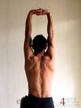 Arm overhead shoulder stretch, hands clasped and palms pressing upwards, neil keleher, sensational yoga poses.