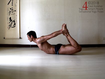bow pose bow pose. From a prone/belly down position, grab the ankles from behind the back. Pull back with your feet to help lift your chest. At the same time lift your knees.