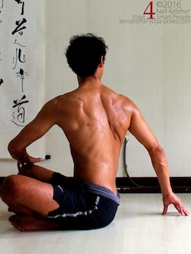 Cross Leg Twist Hand Assisted 3 Sitting with legs crossed one hand is placed on the opposite knee. The other hand is on the floor just behind the body. Both arms are being used to turn the ribcage to one side, twisting the spine. Neil Keleher. Sensational Yoga Poses.