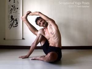 Compass Yoga Pose, an intense hamstring and shoulder stretch, assuming you can grab the foot in the first place. Neil Keleher, Sensational Yoga Poses.