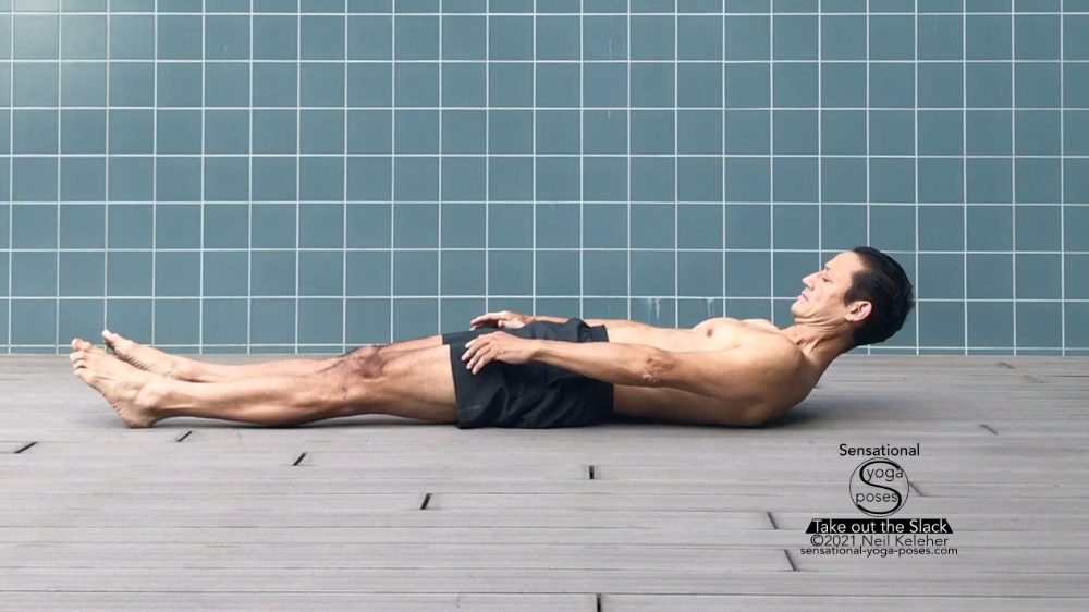 straight leg situp with head lifted, arms reaching forwards and the shoulders and upper back off of the floor.  Neil Keleher, Sensational Yoga Poses.